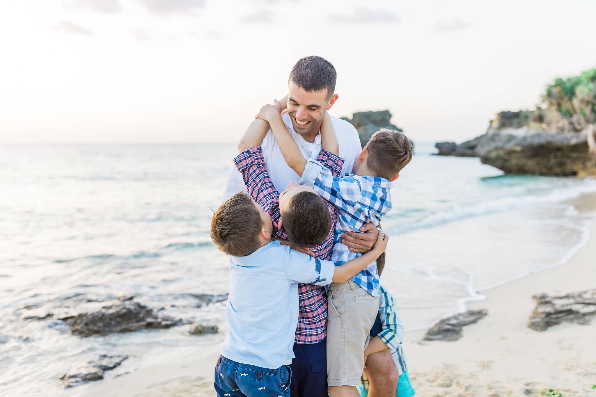 Family photo session on the beach by Heather Johnson Photography