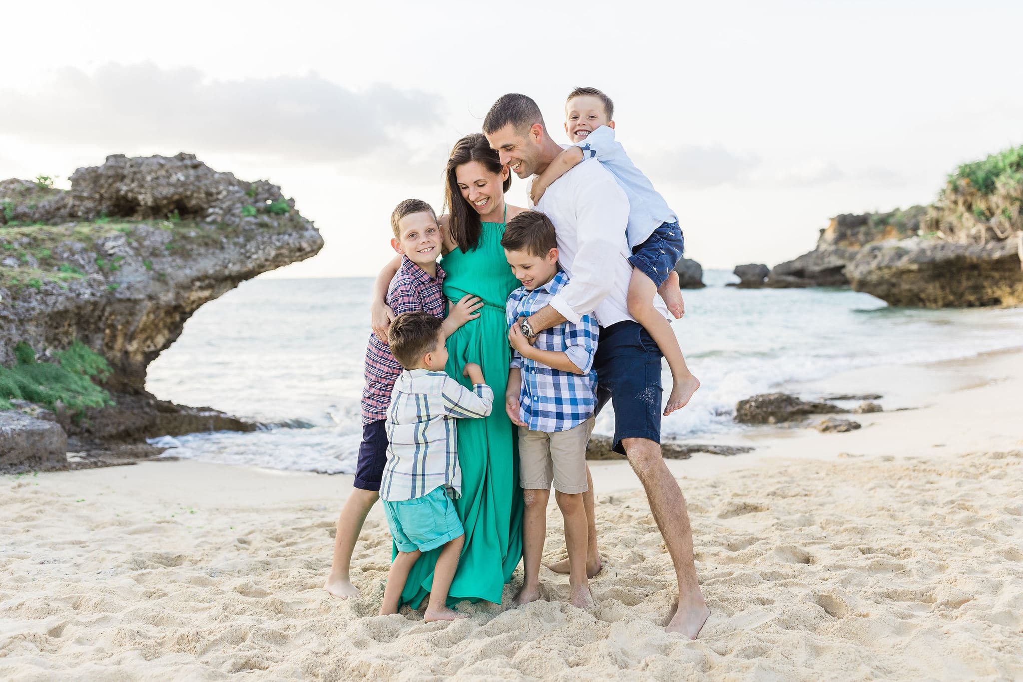 Family photo session on the beach by Heather Johnson Photography