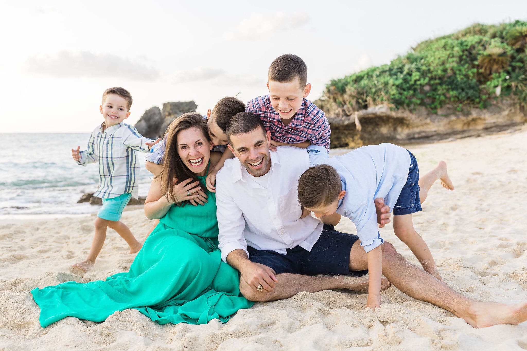 Family photo session on the beach by Heather Johnson Photography