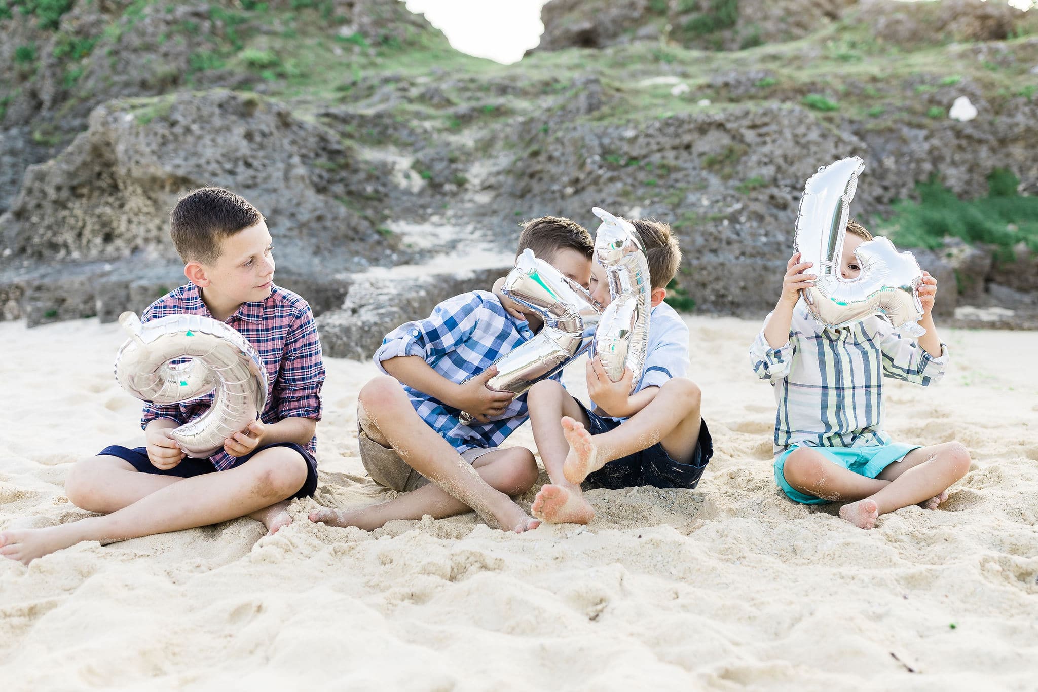 Family photo session on the beach by Heather Johnson Photography