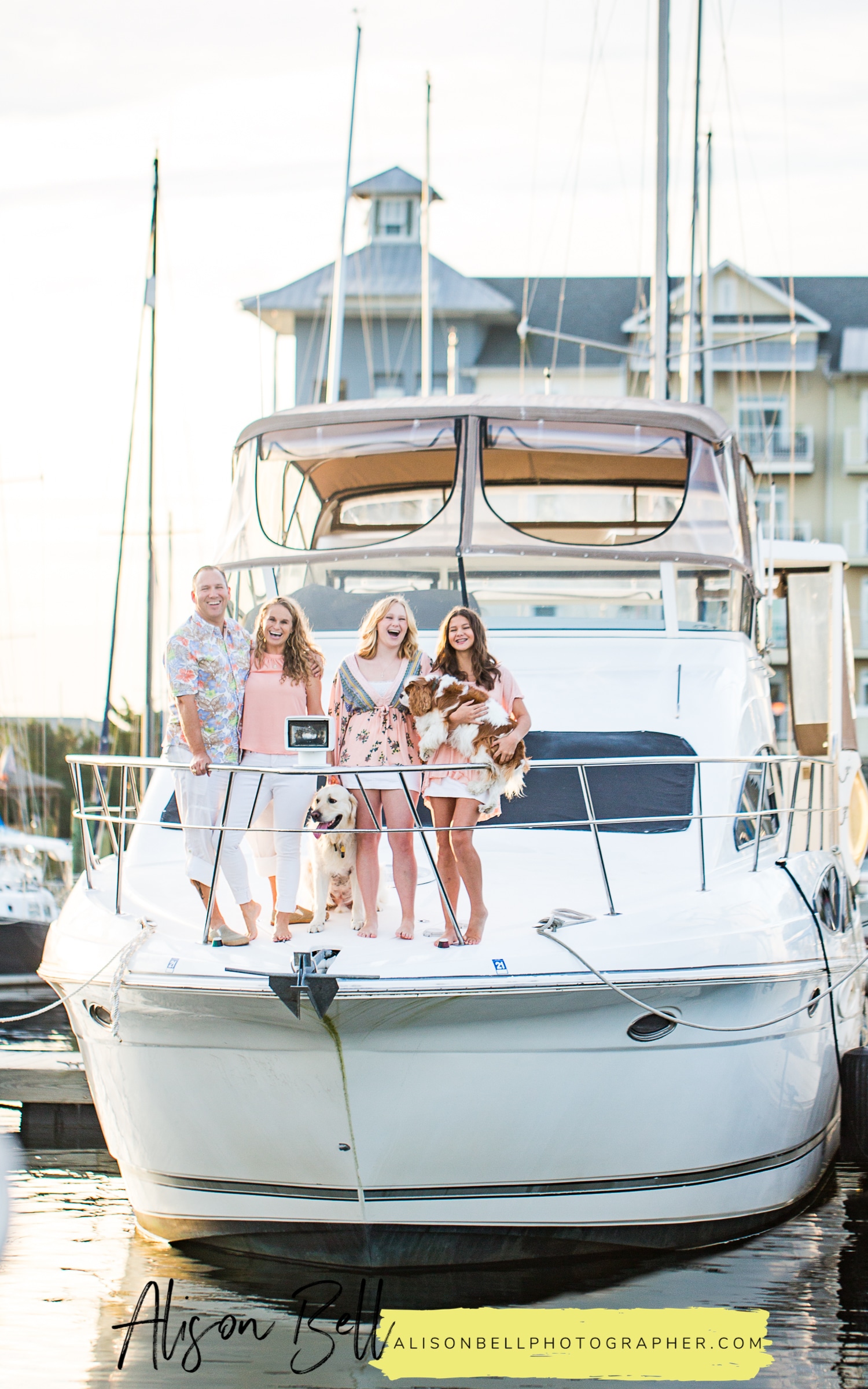 Family photo session on the boat docked in the marina, east beach norfolk