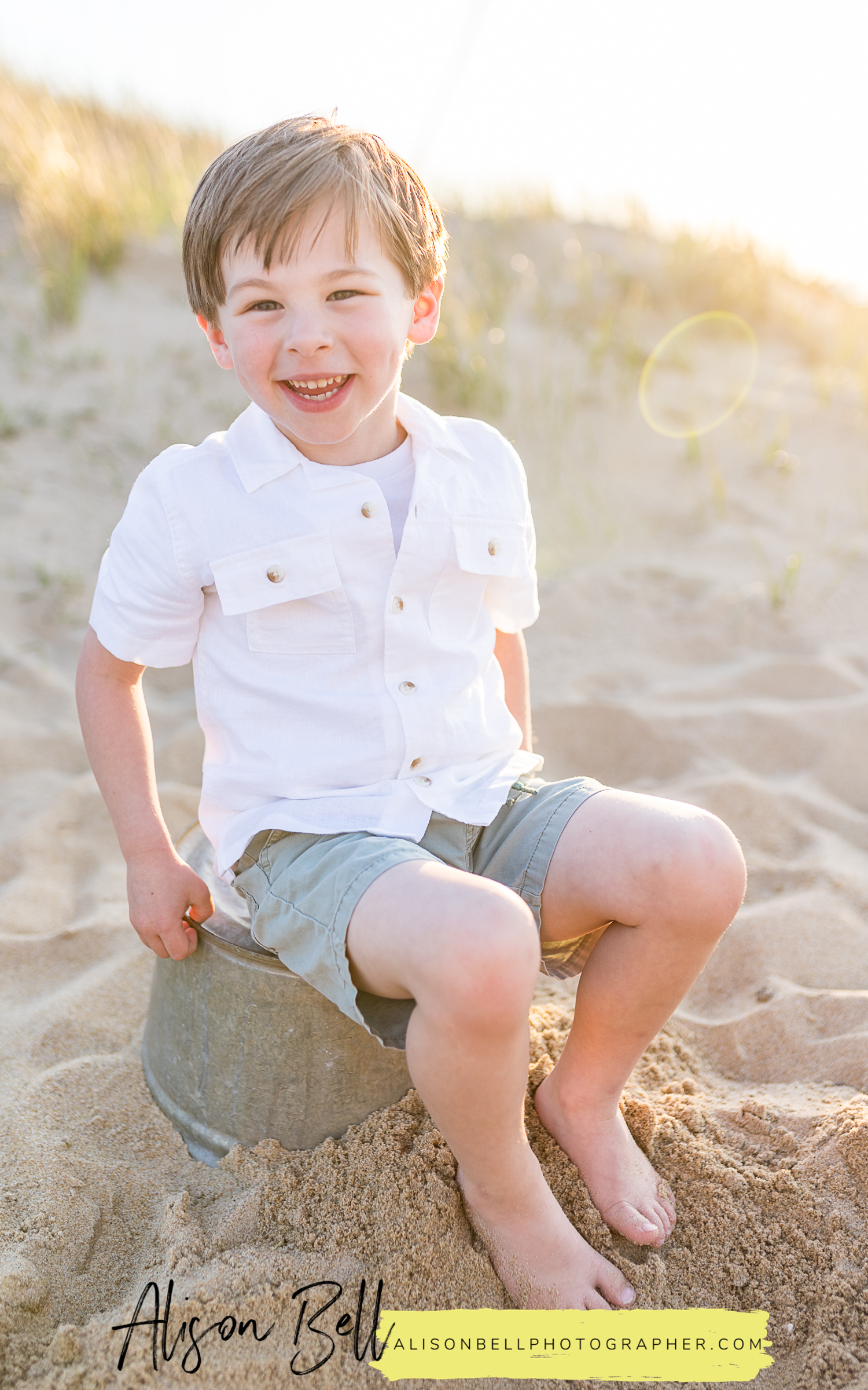 Family photos on the Chesapeake Bay in Viriginia beach. Two boys, family of four