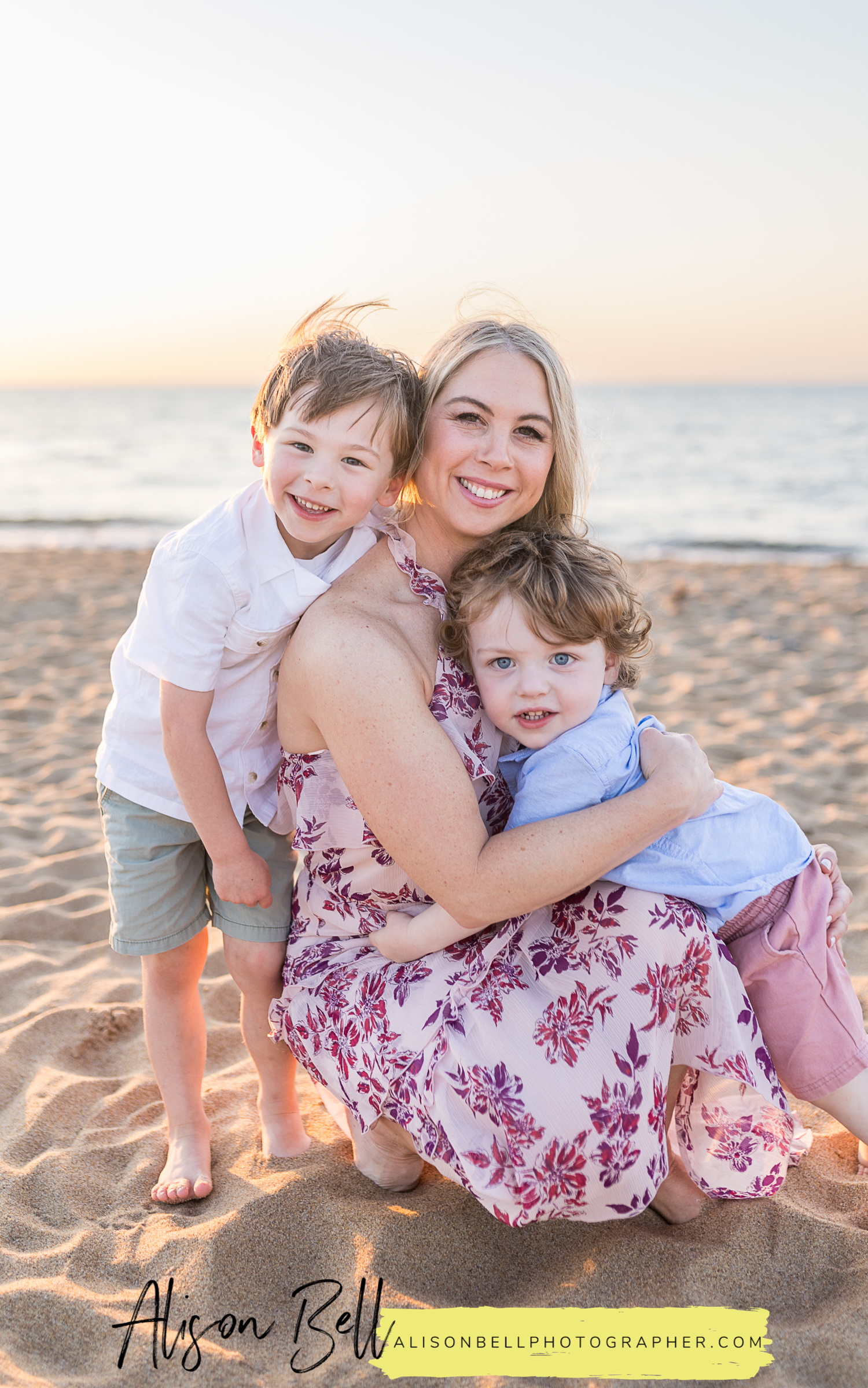 Family photos on the Chesapeake Bay in Viriginia beach. Two boys, family of four
