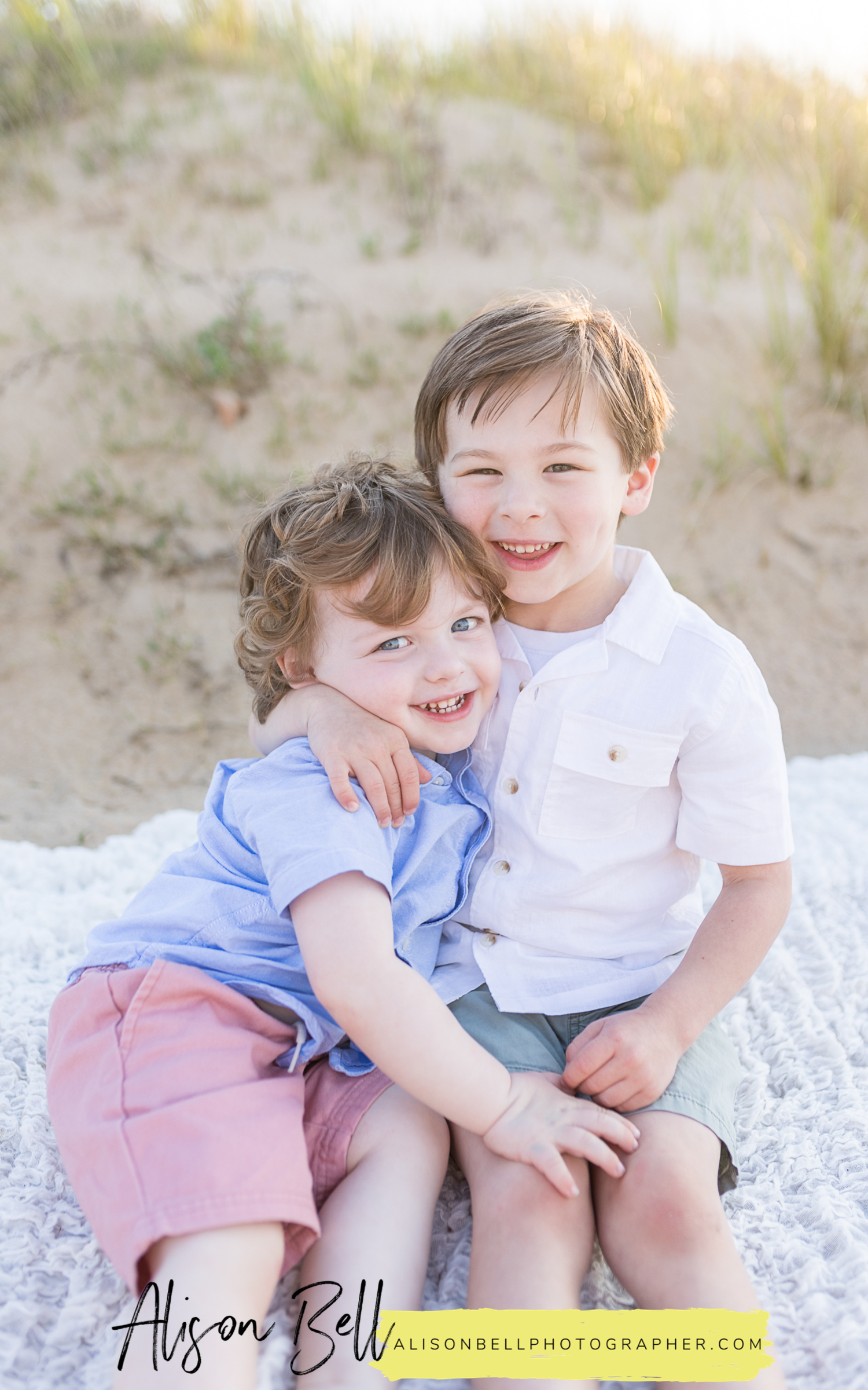 Family photos on the Chesapeake Bay in Viriginia beach. Two boys, family of four